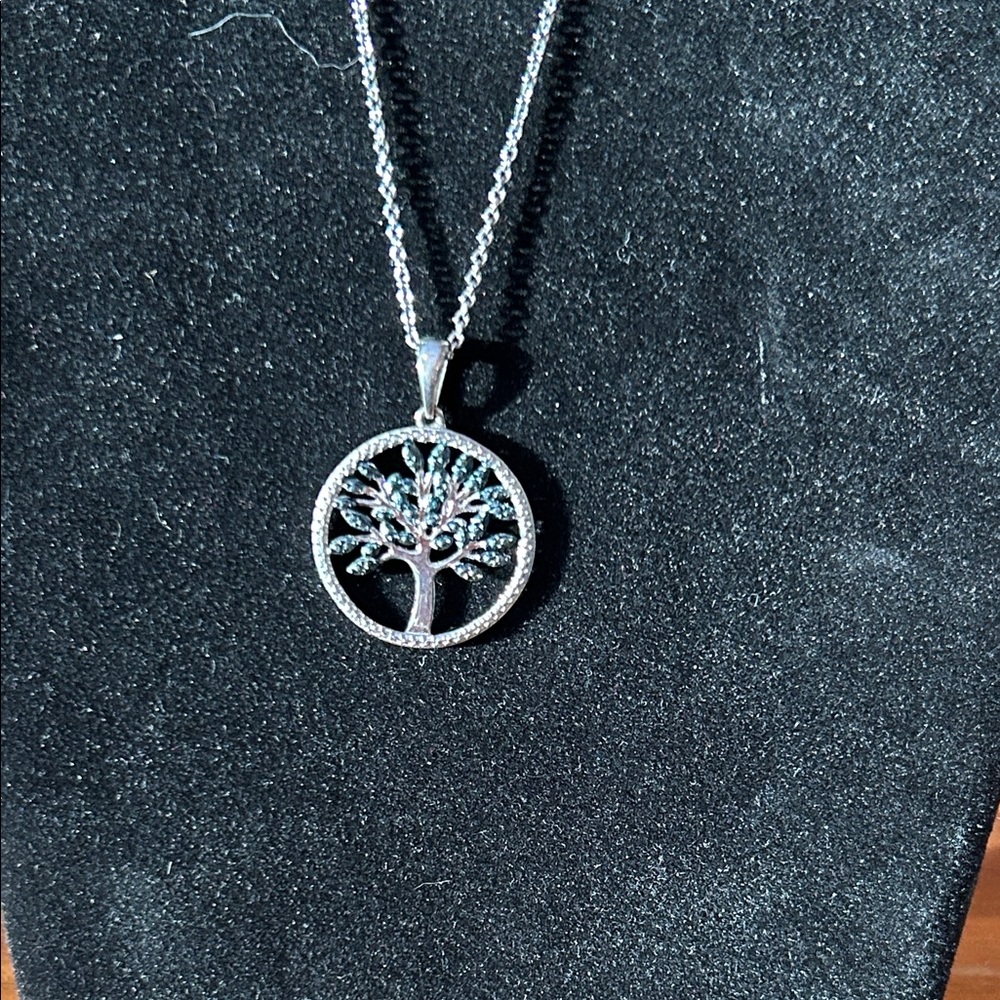 Silver Tree of Life Pendant Necklace with blue diamond chips.